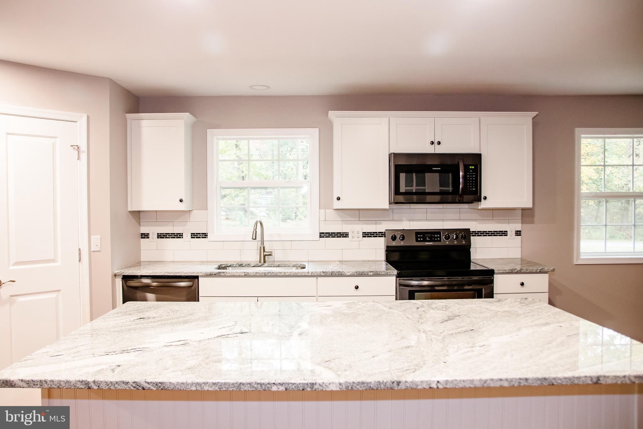 21398 Tanyard Road Preston, MD 21655 - Photo 8 of 27 View of kitchen from the hallway
