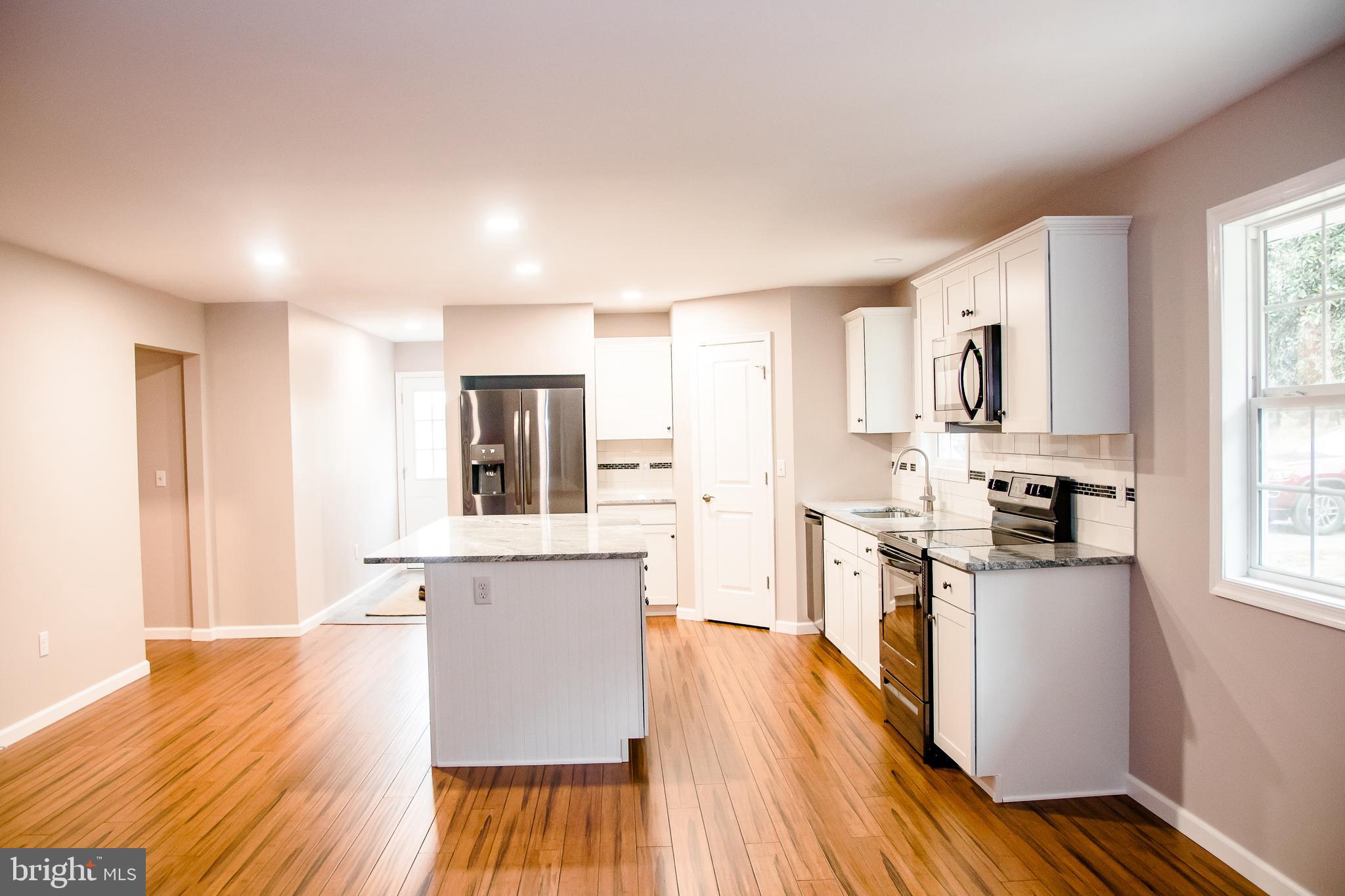 21398 Tanyard Road Preston, MD 21655 - Photo 9 of 27 View of kitchen from from front entrance