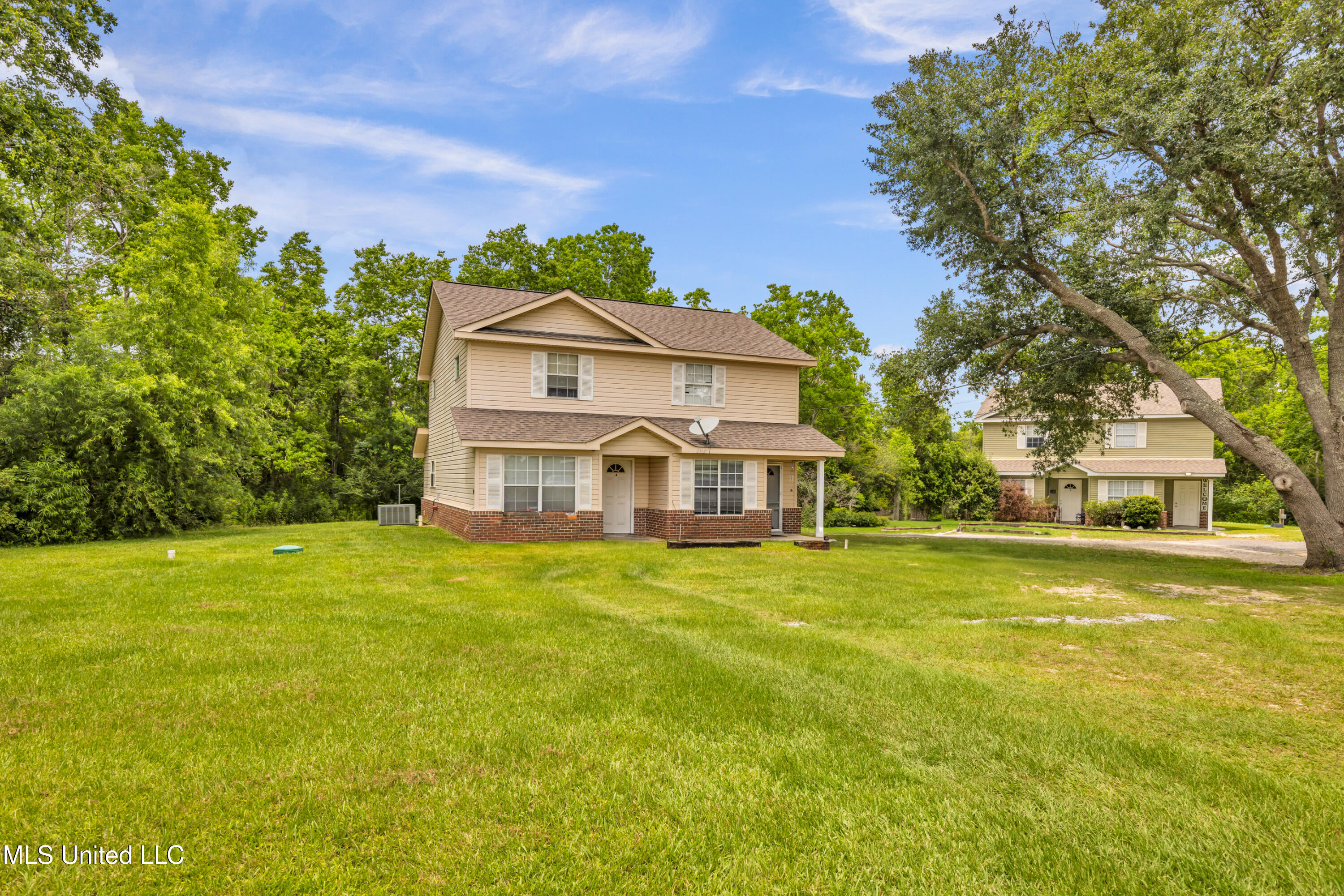 23027 Indian Ridge Road Picayune, MS 39466 - Photo 34 of 117 23021IndianRidgeA&BExterior-2