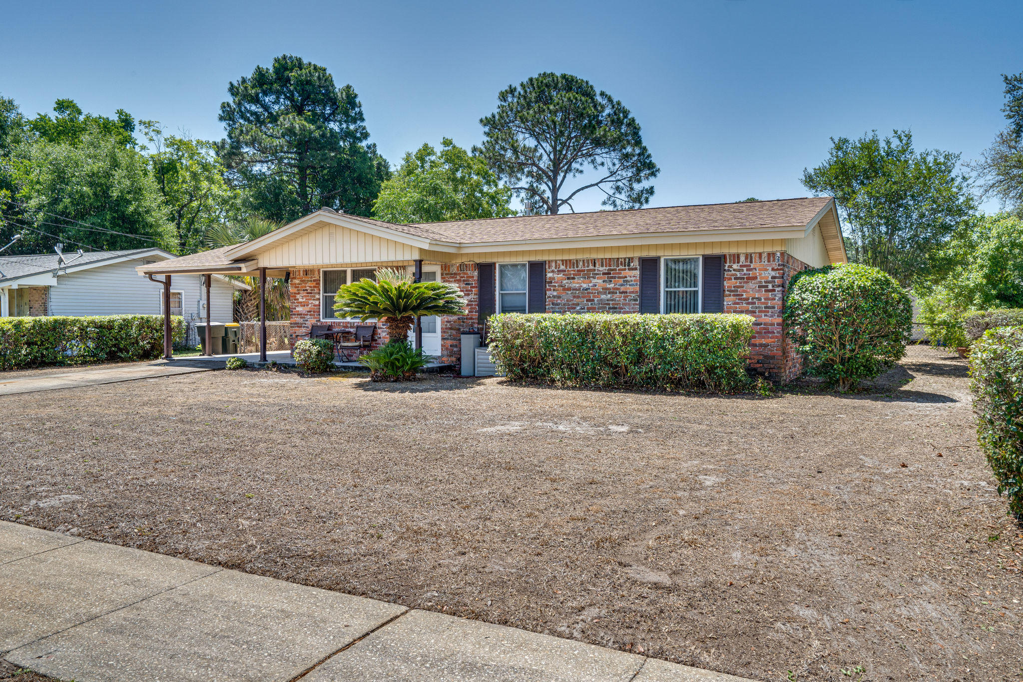 236 Deluna Road Southwest Fort Walton Beach, FL 32548 - Photo 2 of 26 front view of a house with a yard