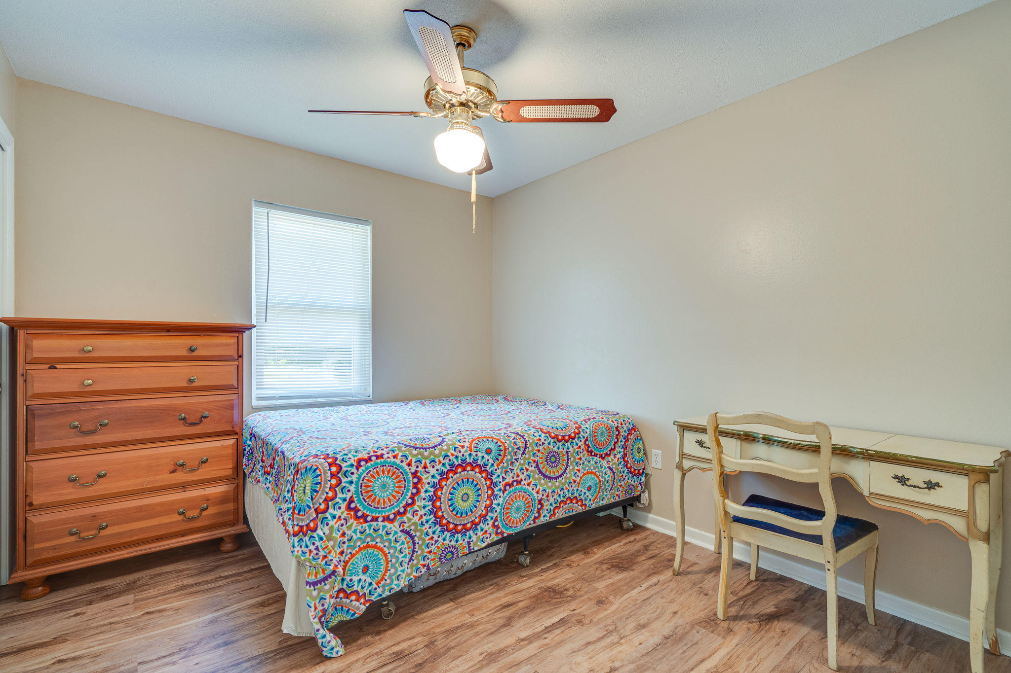 236 Deluna Road Southwest Fort Walton Beach, FL 32548 - Photo 16 of 26 a bedroom with a bed and a dresser