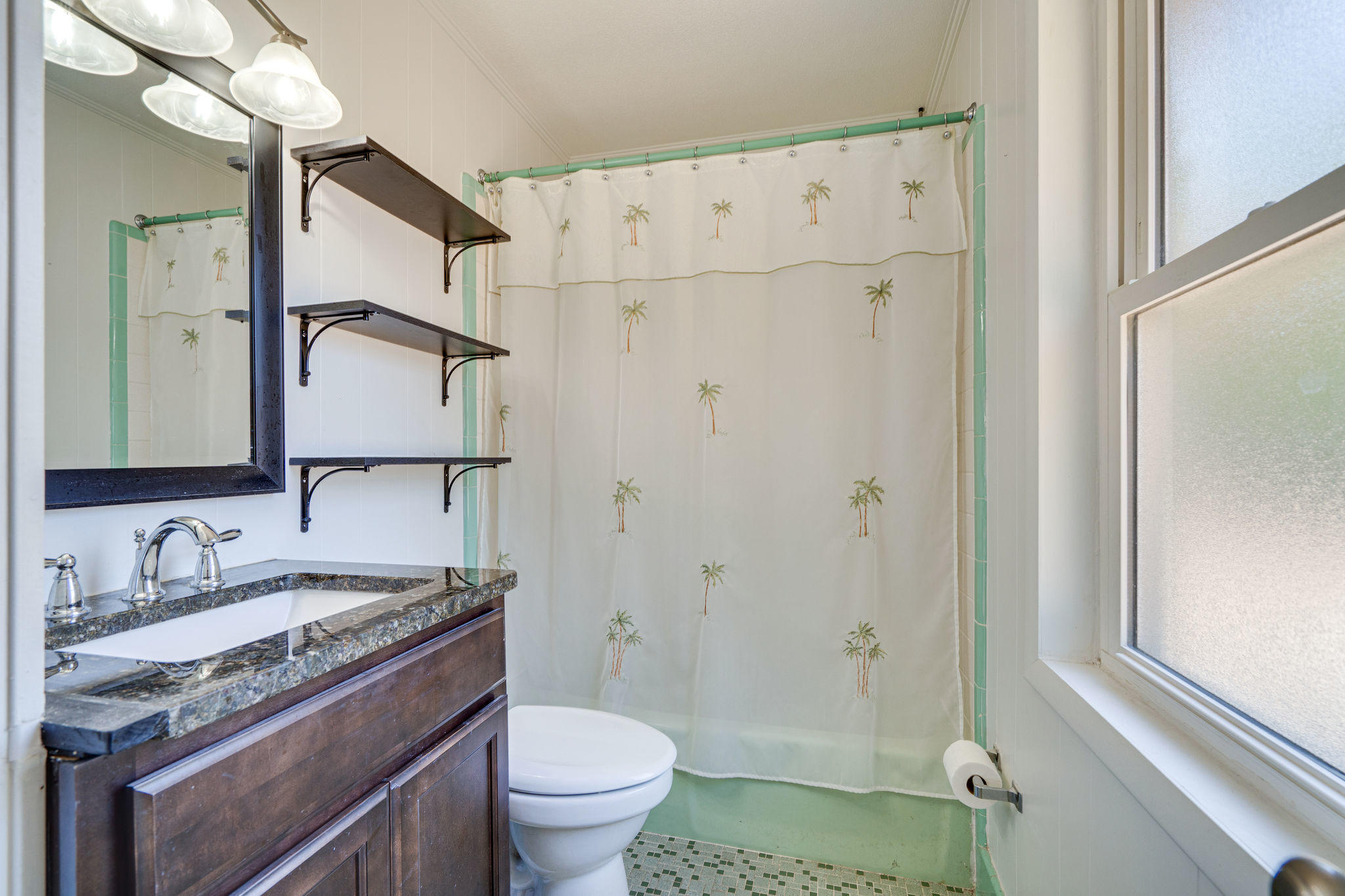 236 Deluna Road Southwest Fort Walton Beach, FL 32548 - Photo 20 of 26 a bathroom with a granite countertop sink toilet and shower