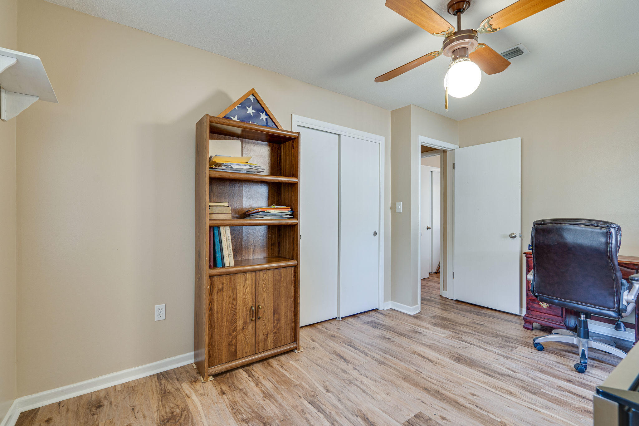 236 Deluna Road Southwest Fort Walton Beach, FL 32548 - Photo 22 of 26 a view of a workspace with furniture and wooden floor