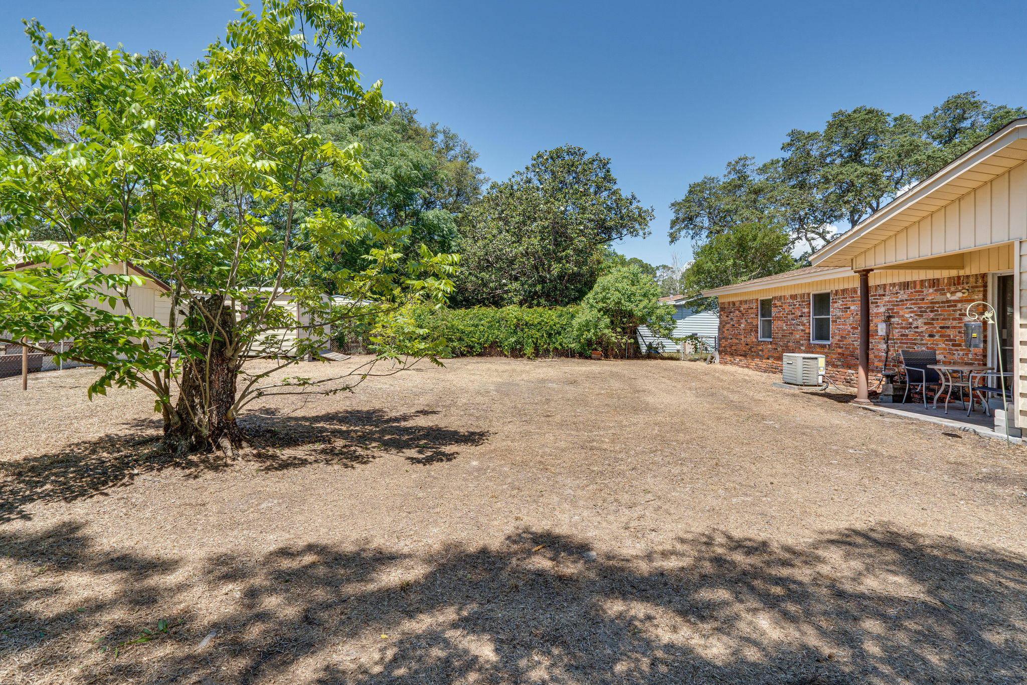 236 Deluna Road Southwest Fort Walton Beach, FL 32548 - Photo 24 of 26 a backyard of a house with lots of green space