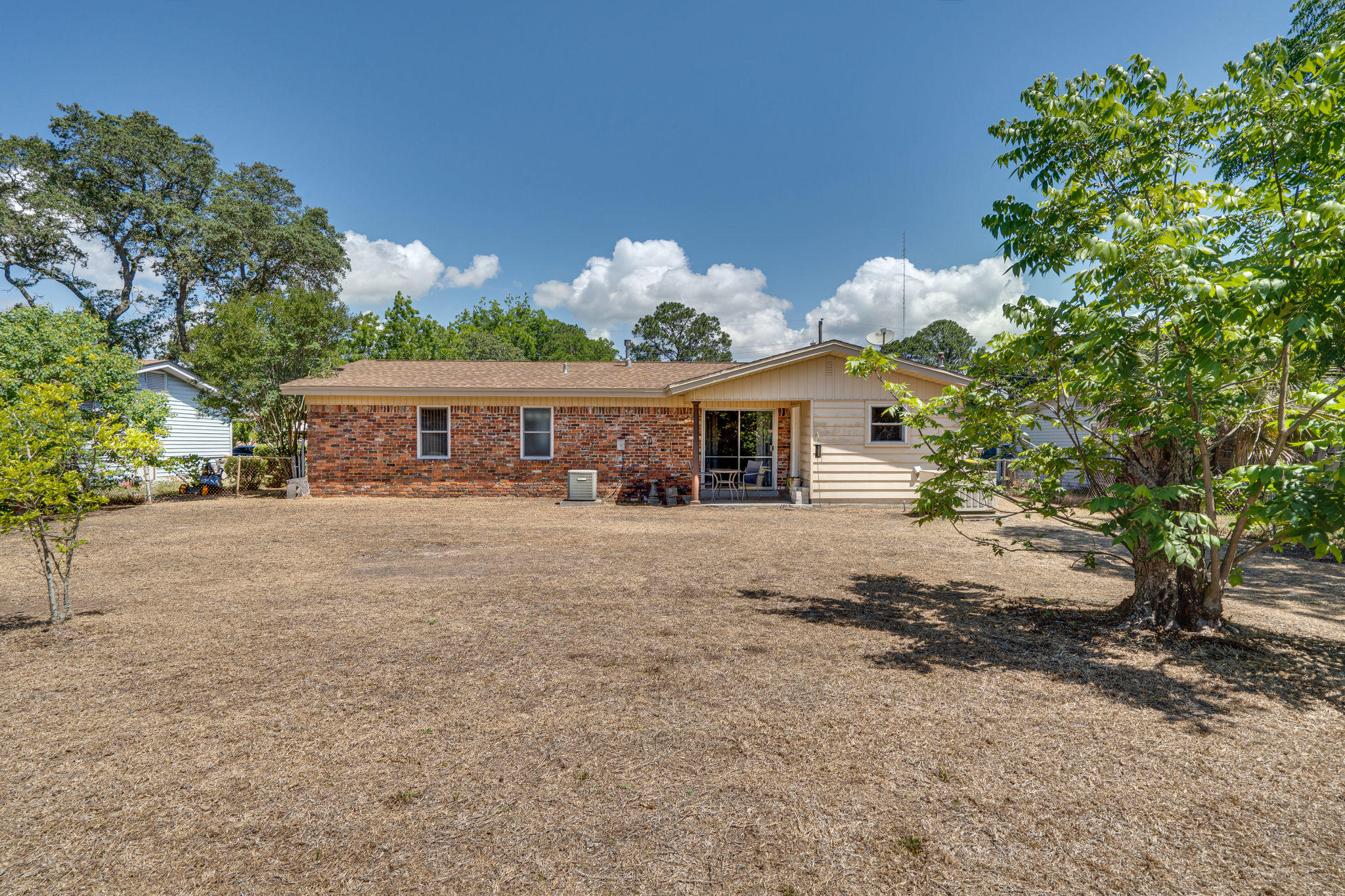 236 Deluna Road Southwest Fort Walton Beach, FL 32548 - Photo 25 of 26 a front view of house with a garden