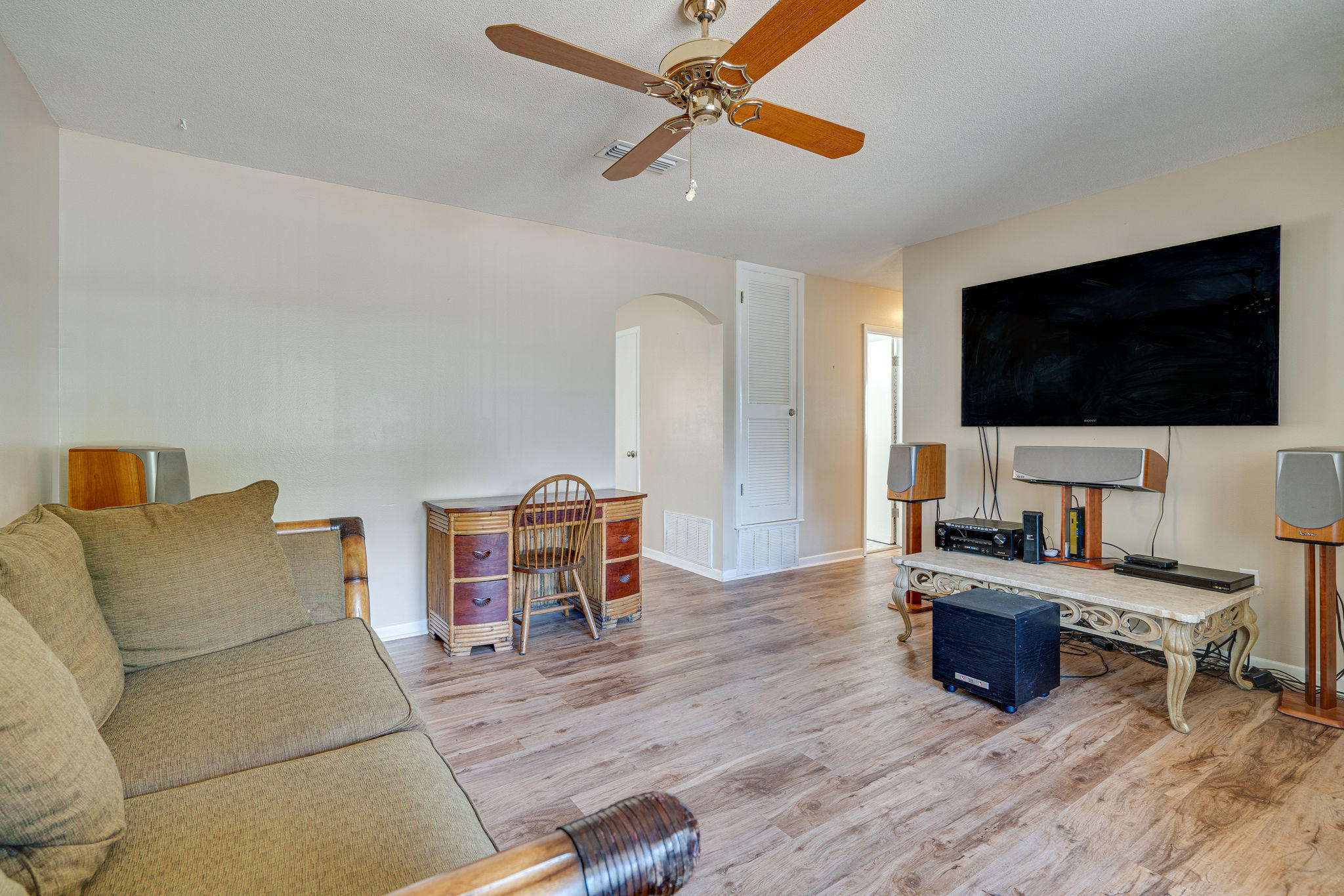 236 Deluna Road Southwest Fort Walton Beach, FL 32548 - Photo 7 of 26 a living room with furniture and a flat screen tv
