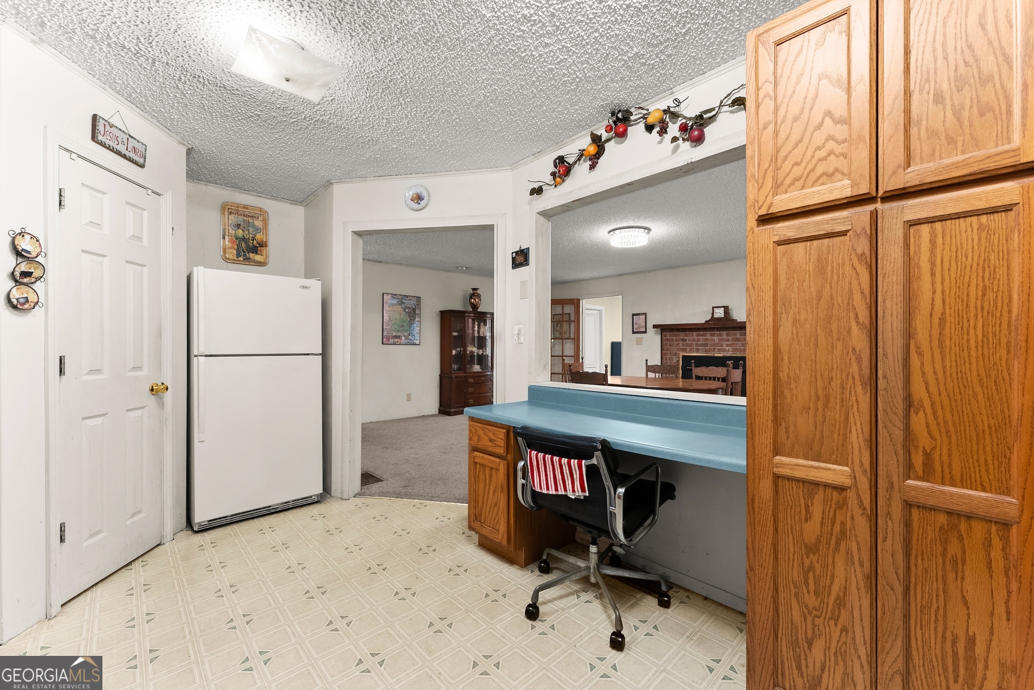 350 Old River Road Cornelia, GA 30531 - Photo 13 of 42 a room with furniture and a refrigerator