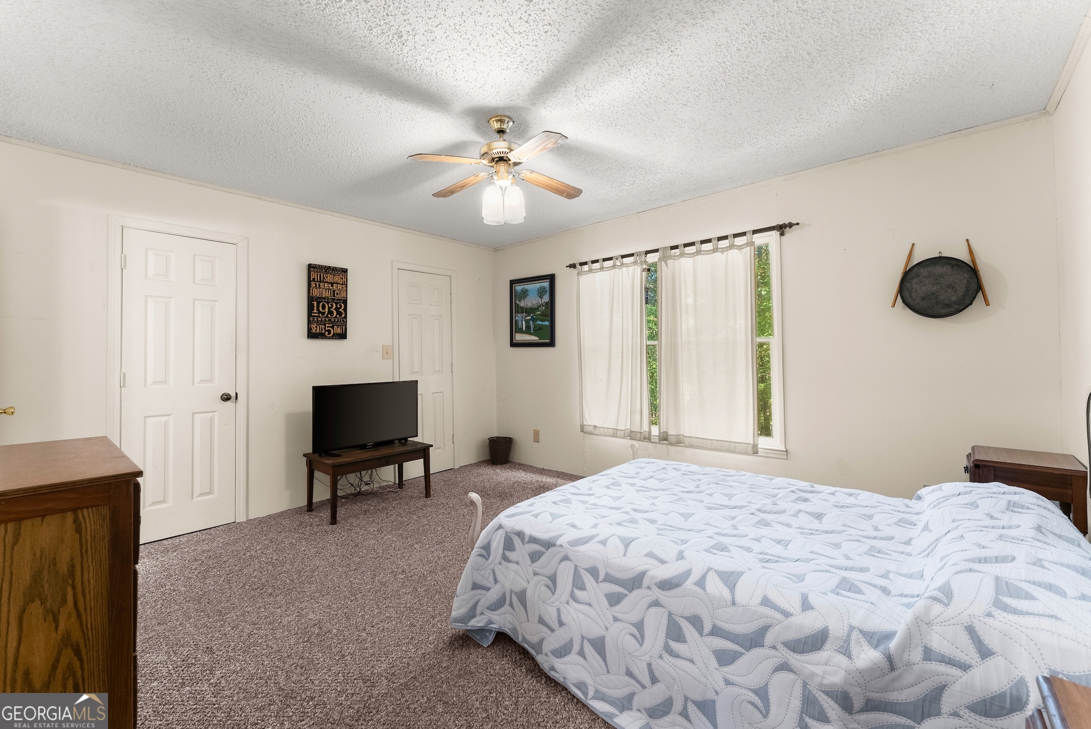 350 Old River Road Cornelia, GA 30531 - Photo 25 of 42 a bedroom with a bed and a window