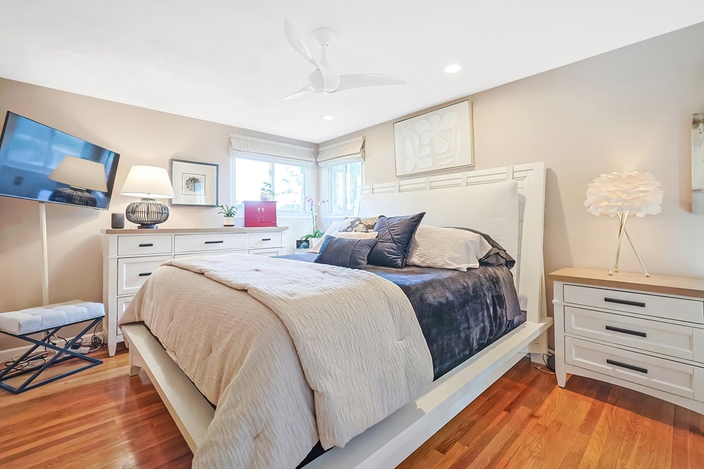 33 Debra Lane Framingham, MA 01701 - Photo 15 of 40 a bedroom with a bed and a dresser