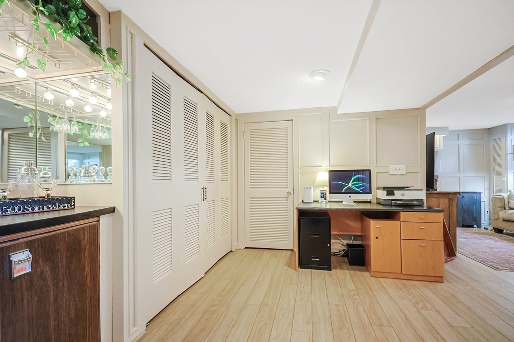 33 Debra Lane Framingham, MA 01701 - Photo 28 of 40 a kitchen with stainless steel appliances a stove top oven and a refrigerator
