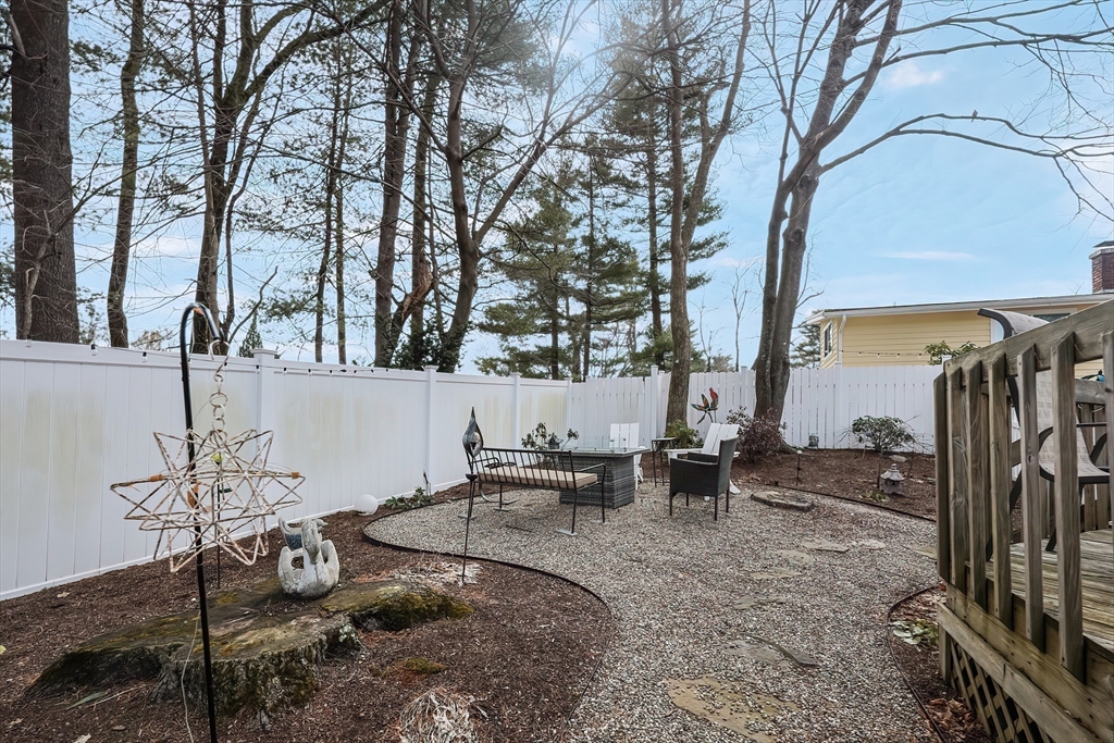 33 Debra Lane Framingham, MA 01701 - Photo 31 of 40 a view of a backyard with sitting area