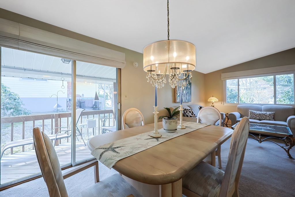 33 Debra Lane Framingham, MA 01701 - Photo 8 of 40 a view of a dining room with furniture window and outside view