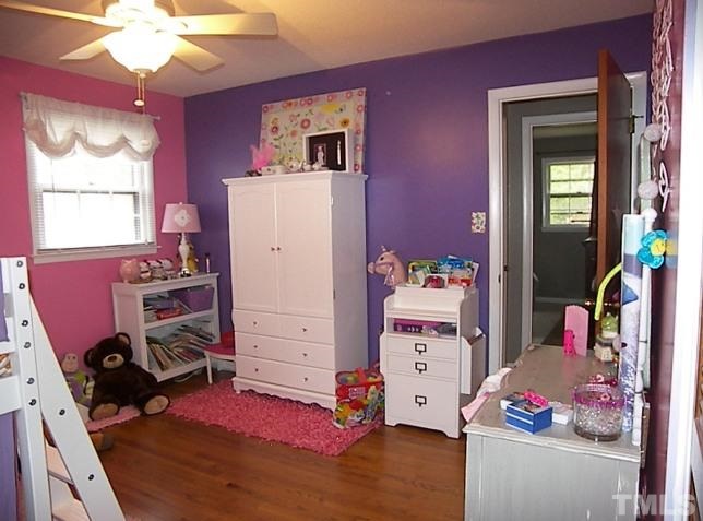 1502 Kennon Road Garner, NC 27529 - Photo 14 of 25 Take advantage of all of the natural sunlight in this room. The possibilities are endless.