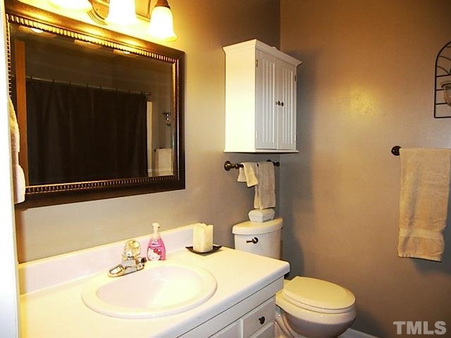 1502 Kennon Road Garner, NC 27529 - Photo 15 of 25 Nicely appointed hall bath.