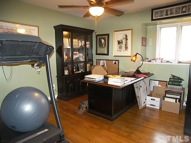 1502 Kennon Road Garner, NC 27529 - Photo 16 of 25 Bedroom 3 is also spacious and again features lovely hardwood floors.