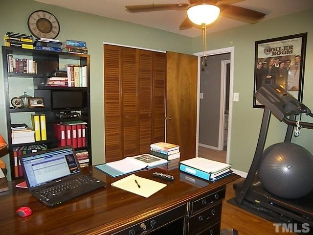 1502 Kennon Road Garner, NC 27529 - Photo 18 of 25 Bedroom 3 also has good closet space and has potential as a fitness room as well.