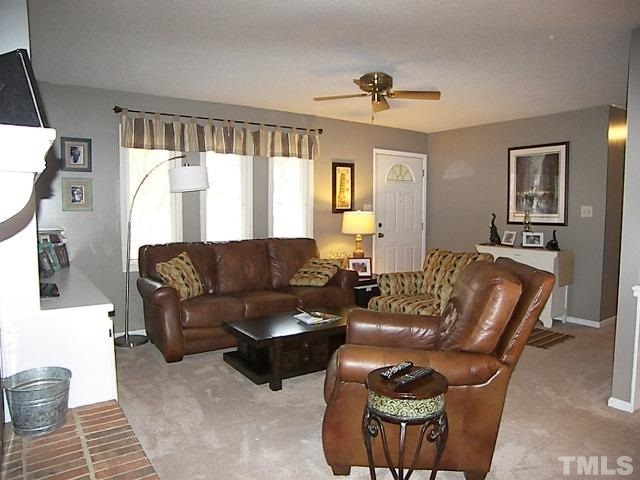 1502 Kennon Road Garner, NC 27529 - Photo 3 of 25 Large living room is nice and bright, and welcomes you home.