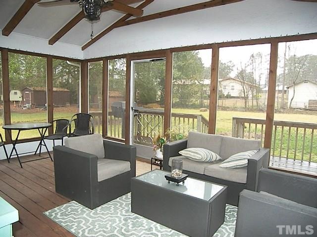 1502 Kennon Road Garner, NC 27529 - Photo 20 of 25 Large enough for two sitting areas. Complete with cable and access to your deck for grilling.