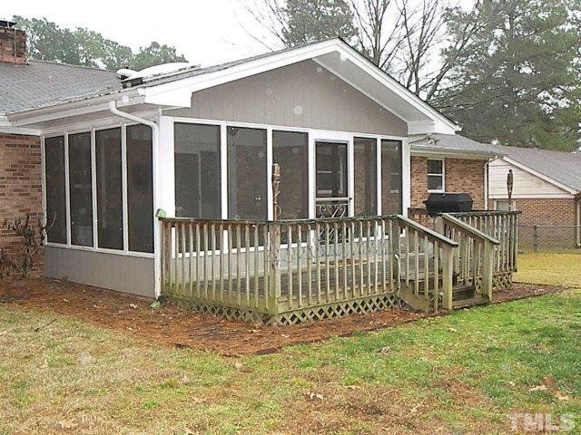 1502 Kennon Road Garner, NC 27529 - Photo 23 of 25 Convenient screened porch and deck access.