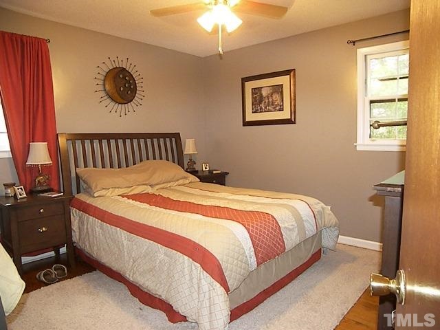 1502 Kennon Road Garner, NC 27529 - Photo 8 of 25 Master bedroom retreat is privately tucked away on the back of the home, and features an en suite Master Bath.