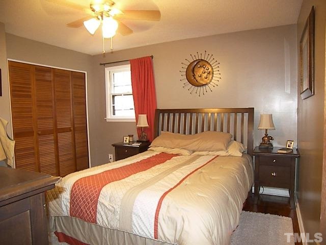 1502 Kennon Road Garner, NC 27529 - Photo 9 of 25 Master bedroom also features gleaming hardwoods and great closet space.