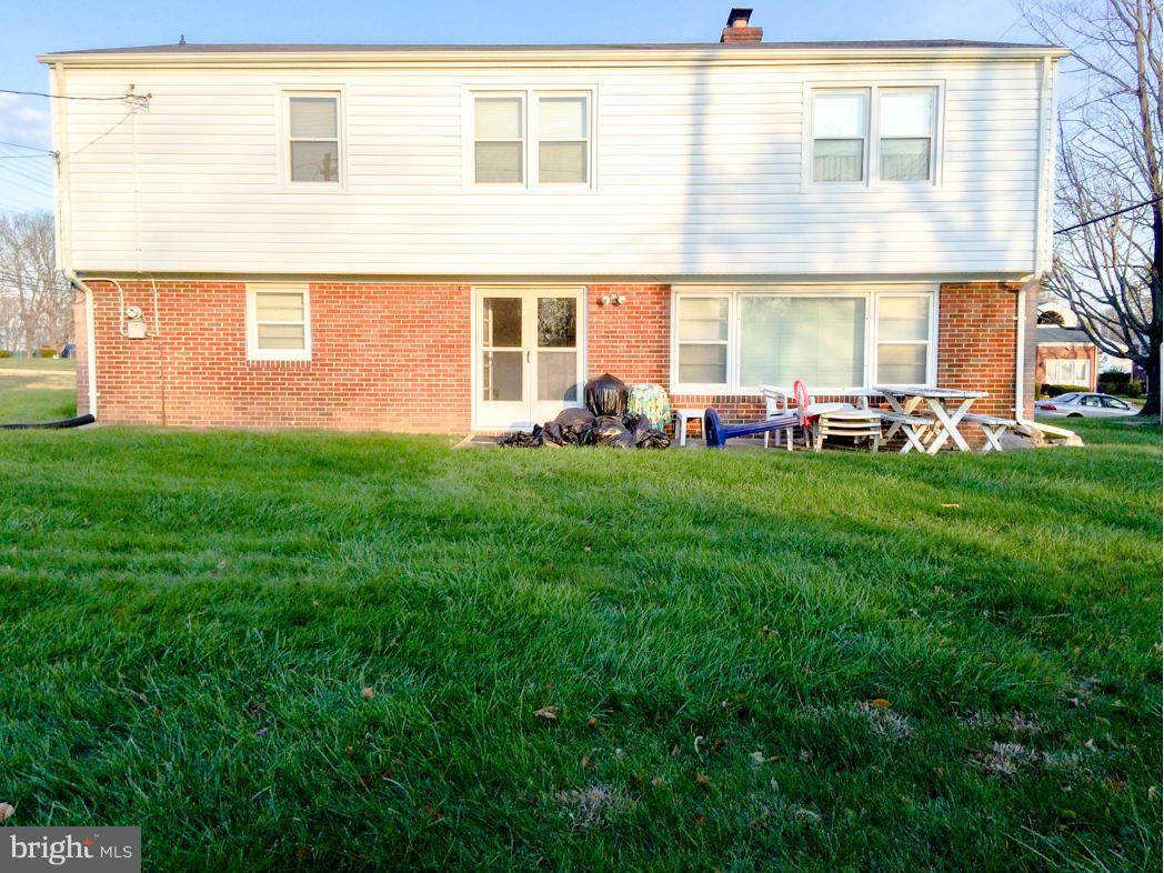 7512 Labyrinth Road Pikesville, MD 21208 - Photo 24 of 24 front view of a house with a yard