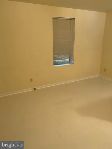 an empty room with a door