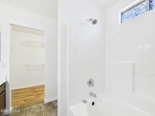 a bathroom with a bathtub