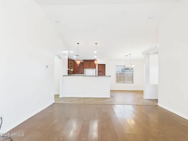 a view of a kitchen with kitchen and a window