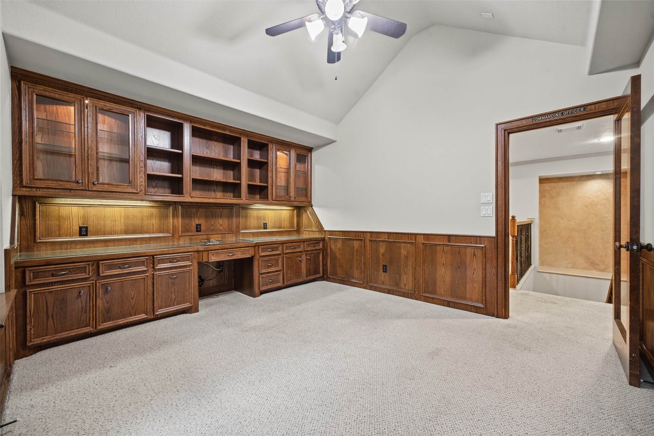 25119 Arcane Court Spring, TX 77389 - Photo 33 of 50 Another view of the office. A French door provides privacy while still being able to view the activities within the house. Click on the movie reel icon to see our AI-narrated walk-through video of this amazing second floor!