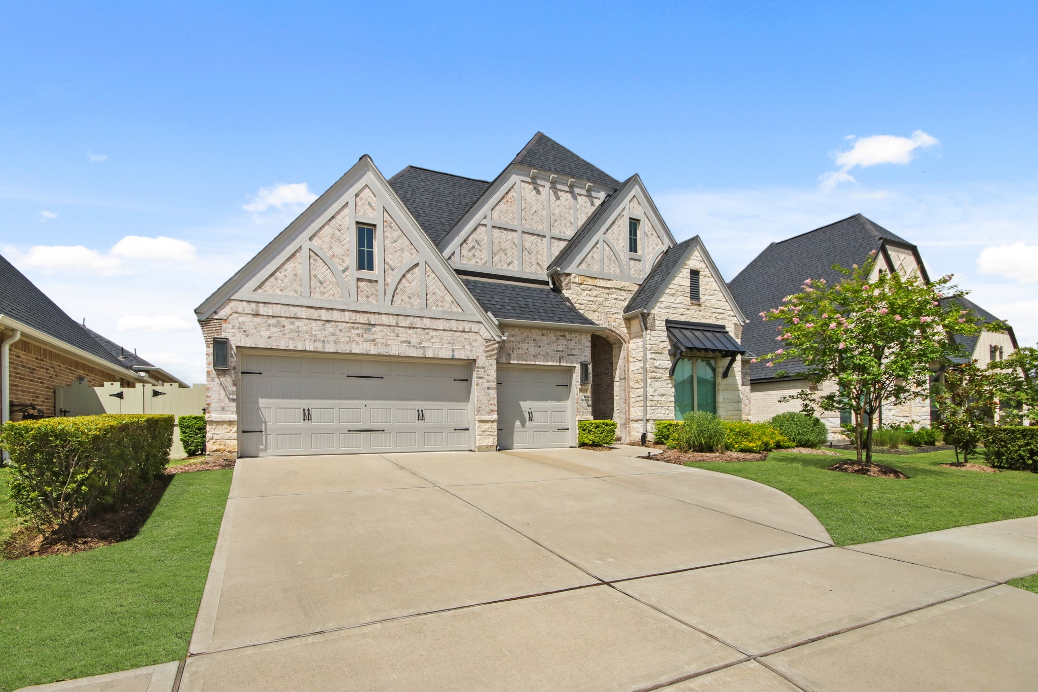 17406 Bayflower Conroe, TX 77385 - Photo 3 of 35 Gorgeous modern design and extra large driveway for three car garage!