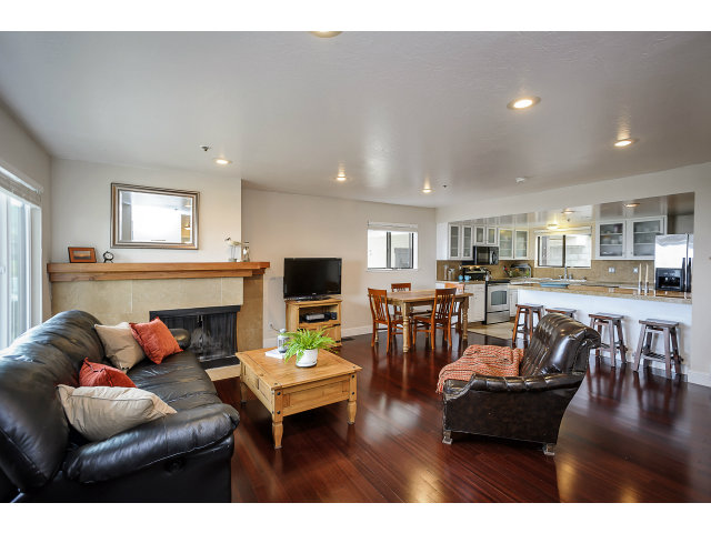 508 Monterey Road, Unit E Pacifica, CA 94044 - Photo 1 of 17 a living room with furniture and a fireplace