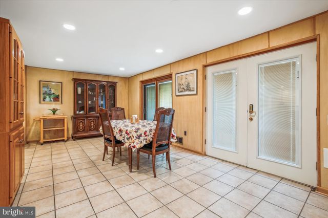 a dining room well furnished