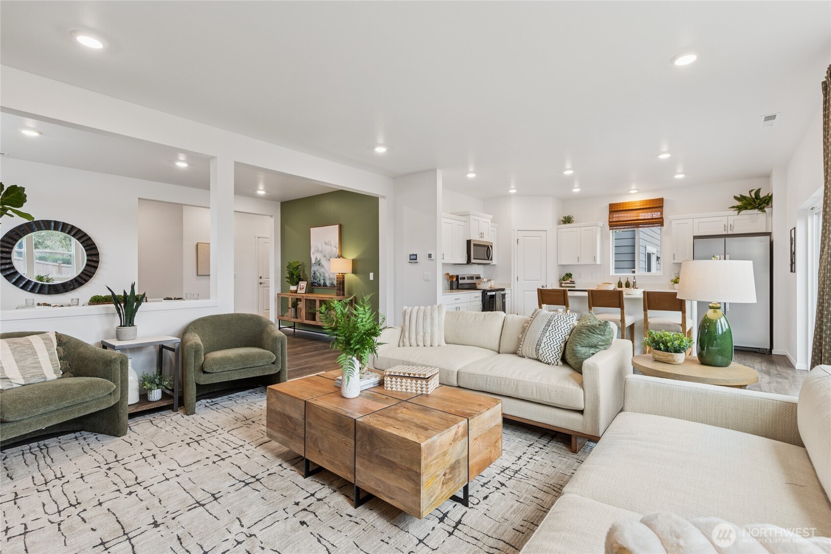 541 Hann Street, Unit 6 Buckley, WA 98321 - Photo 8 of 36 a living room with furniture kitchen view and a large window