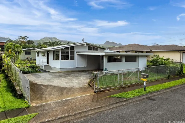 front view of house with a yard