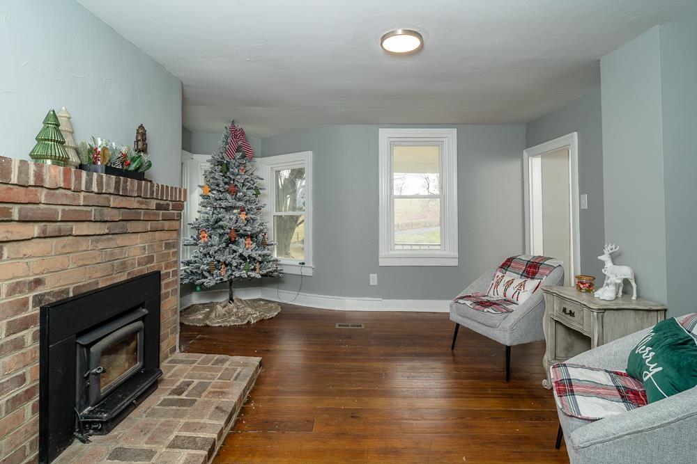 3228 Shutterlee Mill Road Staunton, VA 24401 - Photo 8 of 43 a living room with furniture and a fireplace