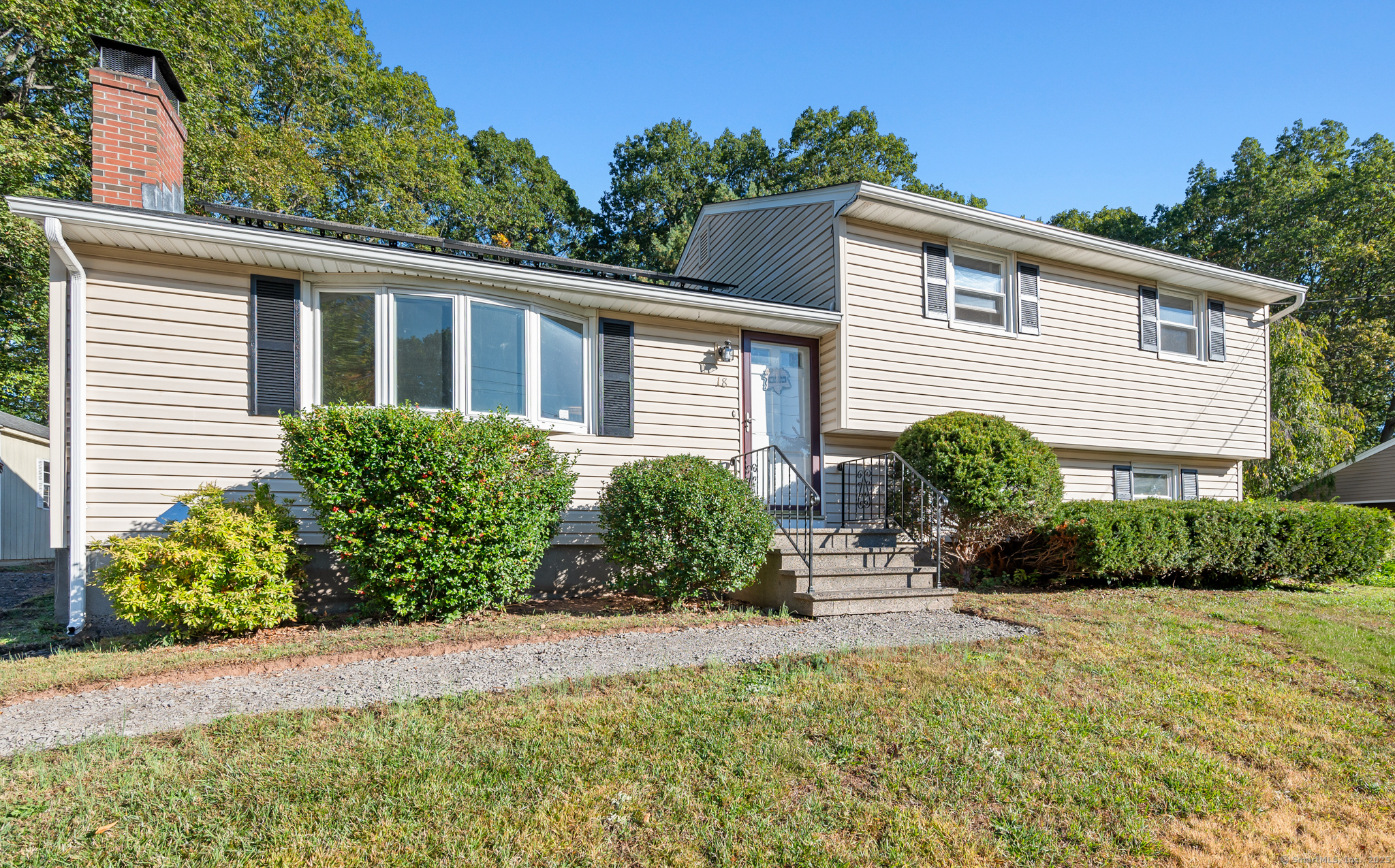 a house view with a outdoor space