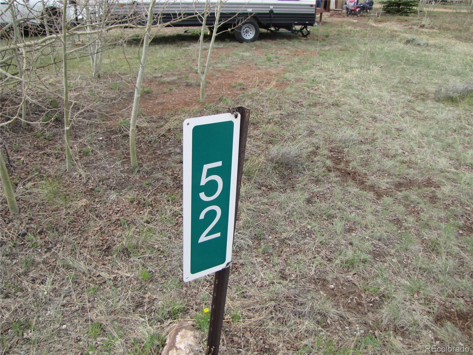 Undisclosed Address Fairplay, CO 80440 - Photo 2 of 11 a sign board on a brick wall