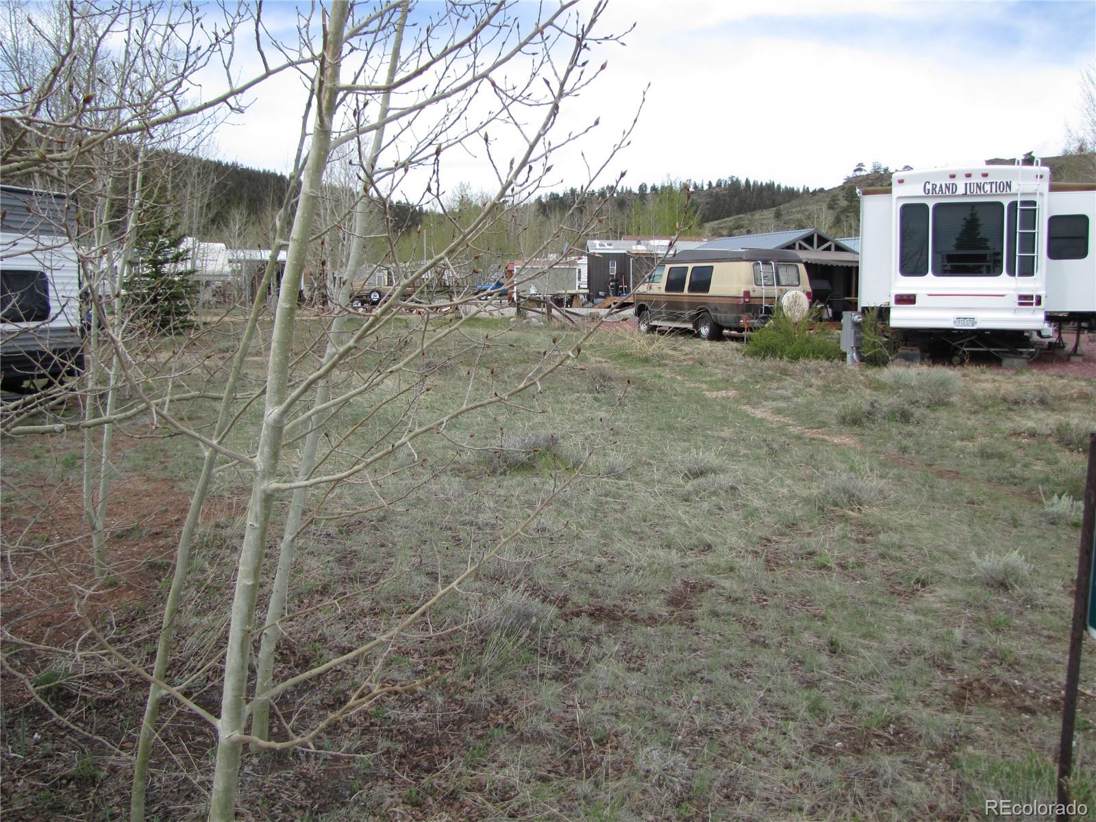 Undisclosed Address Fairplay, CO 80440 - Photo 5 of 11 a view of a house with a yard and sitting area