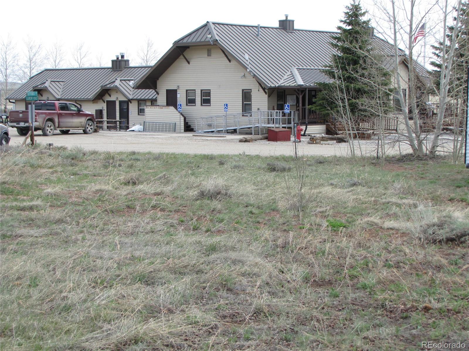 Undisclosed Address Fairplay, CO 80440 - Photo 9 of 11 a view of house with a big yard and large trees