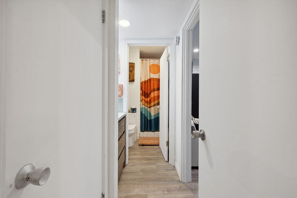 11625 Texas Avenue, Unit 101 Los Angeles, CA 90025 - Photo 27 of 40 a view of a hallway with wooden floor and closet