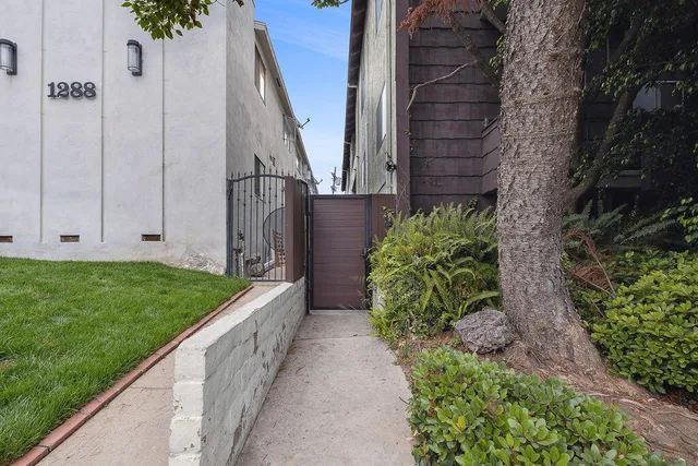 a city street with a building in the background