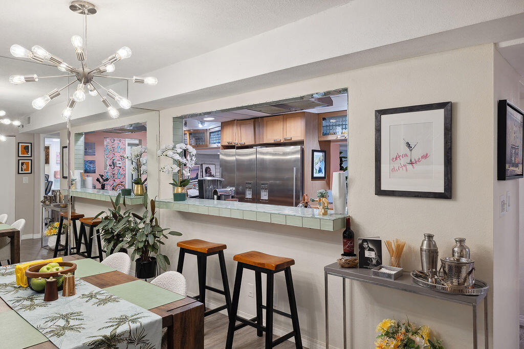 11625 Texas Avenue, Unit 101 Los Angeles, CA 90025 - Photo 10 of 40 a kitchen with a table and chairs in it