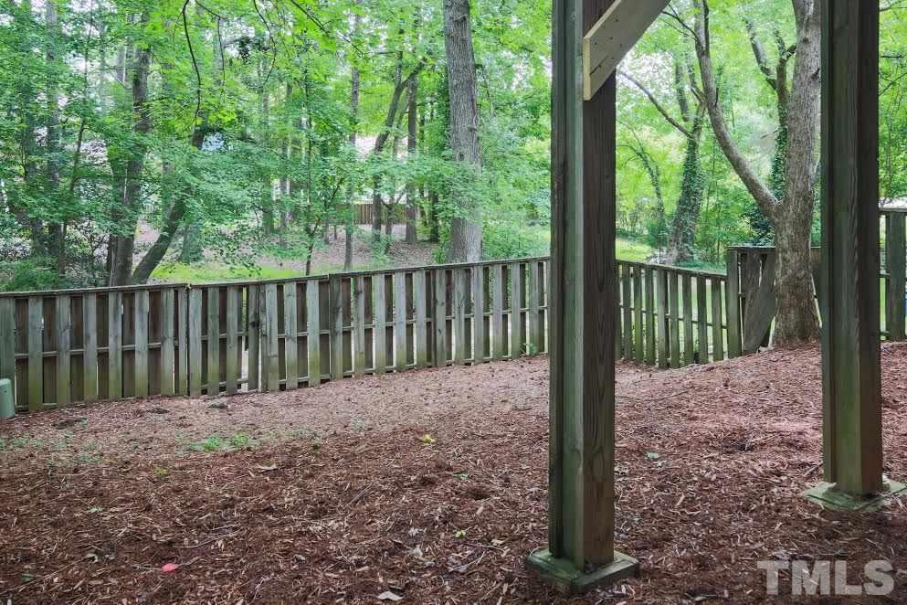 1502 Hemphill Drive Raleigh, NC 27609 - Photo 6 of 14 Large backyard with privacy fence and easy walk-out access from patio.