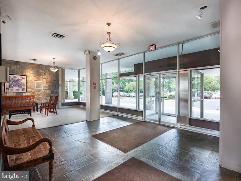 3245 Rio Drive, Unit 604 Falls Church, VA 22041 - Photo 14 of 20 Inviting lobby with modern charm.