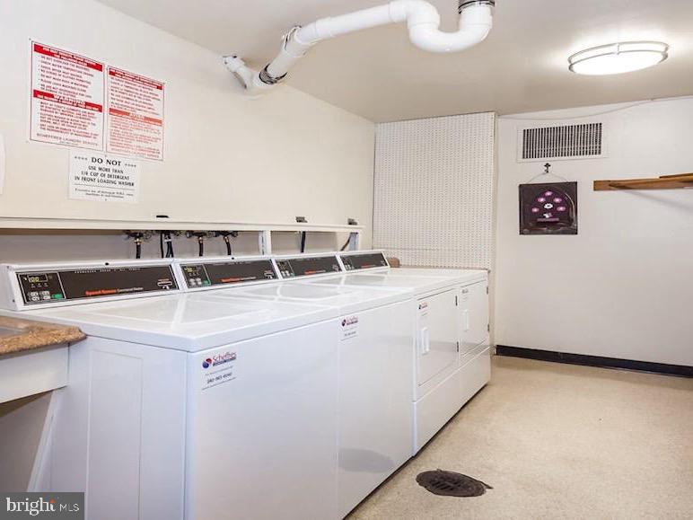 3245 Rio Drive, Unit 604 Falls Church, VA 22041 - Photo 20 of 20 Bright and functional laundry space.