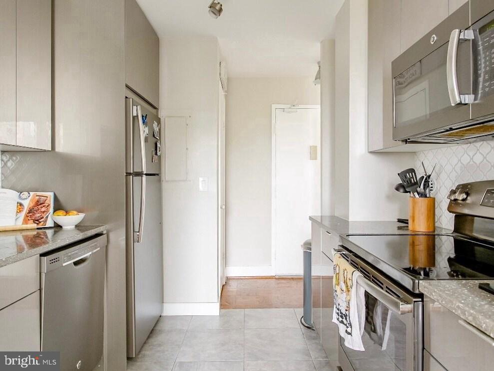 3245 Rio Drive, Unit 604 Falls Church, VA 22041 - Photo 4 of 20 Sleek modern kitchen with stylish finishes.