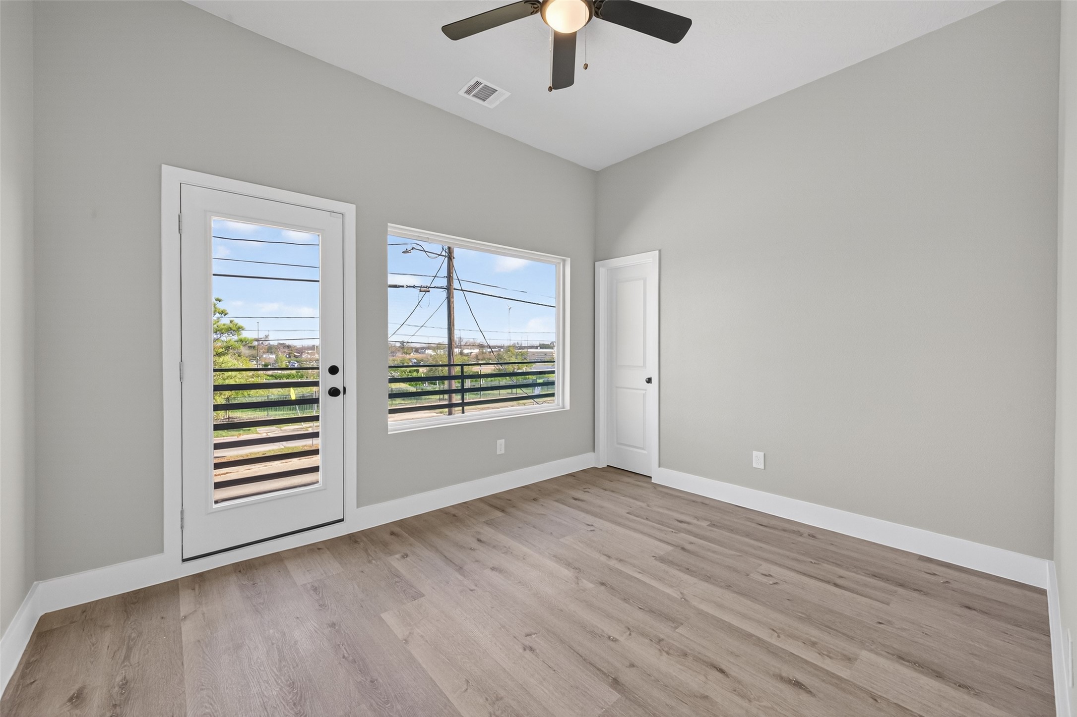 4117 Yale Street Houston, TX 77018 - Photo 25 of 37 wooden floor in an empty room with a window