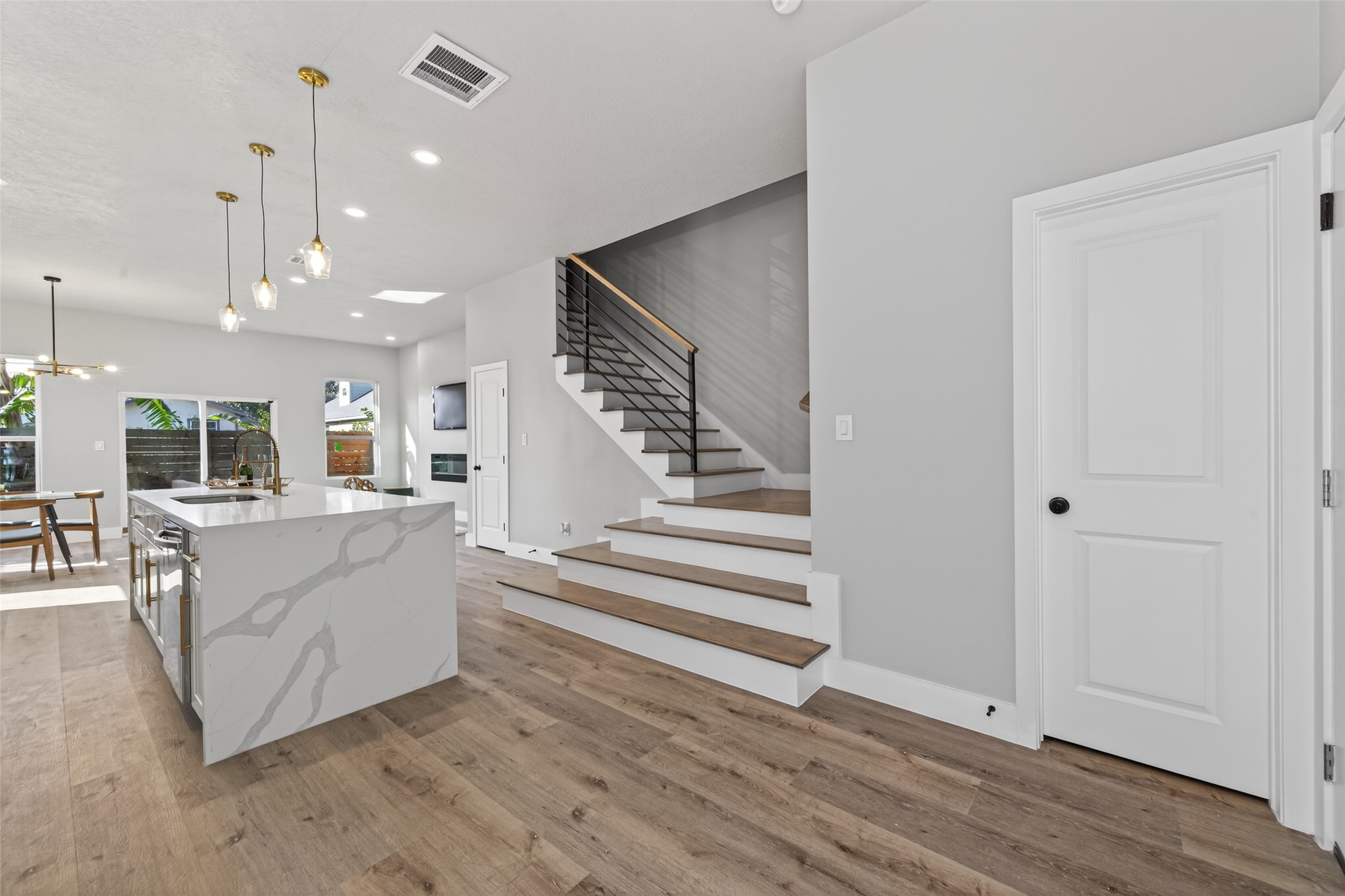 4117 Yale Street Houston, TX 77018 - Photo 8 of 37 a living room with furniture and a wooden floor