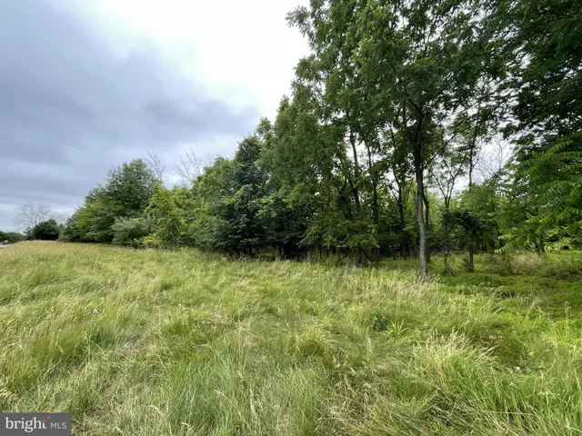 a picture of a bathroom with a white door